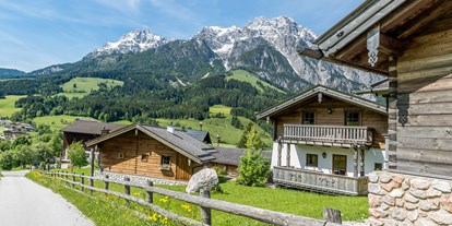 Winterhochzeit - Art der Location: Alm - Berchtesgaden - Das Steinalmdorf mit seinen Chalets. - PURADIES Hotel & Chalets