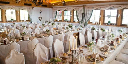 Winterhochzeit - Standesamt - Pörtschach am Wörther See - Hochzeitstafel für ca. 100 Personen im großen Saal E-Form - Gipfelhaus Magdalensberg