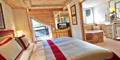 Winterhochzeit - Preisniveau: €€€€ - Innsbruck - Astoria Olympia Suite Badezimmer mit Ausblick - Astoria Resort***** in Seefeld