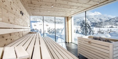 Winterhochzeit - barrierefreie Location - Oberhof (Goldegg) - Sauna im Badhaus. - PURADIES Hotel & Chalets