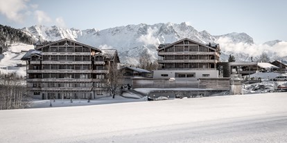 Winterhochzeit - nächstes Hotel - Ellmau - Außenansicht des Hotels - PURADIES Hotel & Chalets