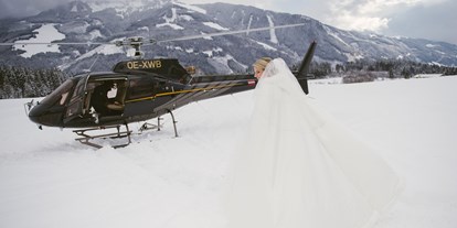 Winterhochzeit - Preisniveau: € - Berchtesgaden - Im Winter könnt ihr mit der Pferdekutsche oder mit dem Helikopter anreisen. - Schloss Prielau Hotel & Restaurants
