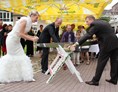 Hochzeitslocation: Traditionelles Holzsägen auf der Hotelterrasse  - Hotel am Schloß Apolda