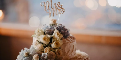 Winterhochzeit - Art der Location: Schloss - Die Hochzeitstorte  - Haselburg