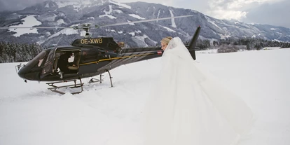 Winterhochzeit - Art der Location: Schloss - Im Winter könnt ihr mit der Pferdekutsche oder mit dem Helikopter anreisen. - Schloss Prielau Hotel & Restaurants