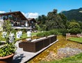 Hochzeitslocation: Eine Agape im Freien im Hotel Kitzhof Mountain Design Resort**** in Kitzbühl, Tirol. - Hotel Kitzhof Mountain Design Resort****